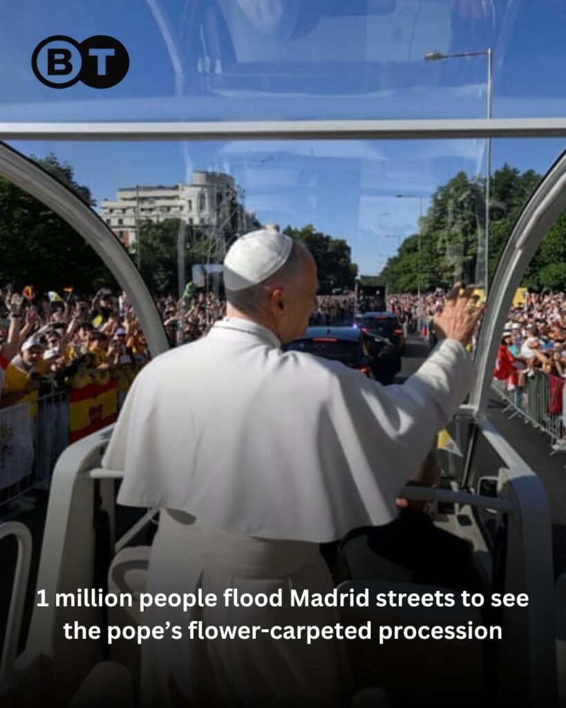 Crowds of nearly one million gathered across Madrid for the pope’s flower-lined procession